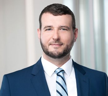 Patrick Smith, Rechtsanwalt / Assoziierter Partner bei GÖRG kennt sich genau mit Utility Token aus!