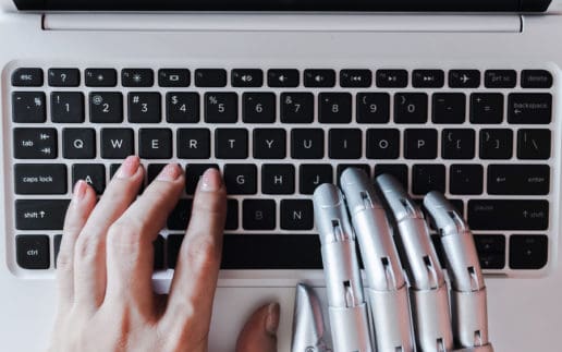 Robot Hands And Fingers Point To Laptop Button Advisor Chatbot R