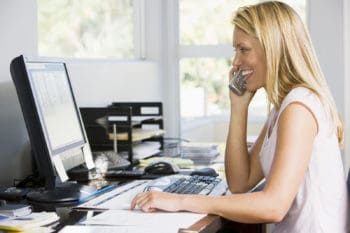 Woman sat working in home office