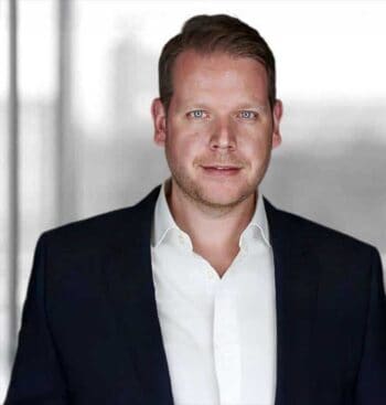 Dr. Christoph Wronka, Leiter Geschäftsbereich Anti-Financial Crime Audit & Advisory bei Baker Tilly, thematisiert die Herausforderungen der Integration des digitalen Euro in bestehende Kernbankensysteme, insbesondere im Kontext öffentlicher Blockchains wie Ethereum und Solana.